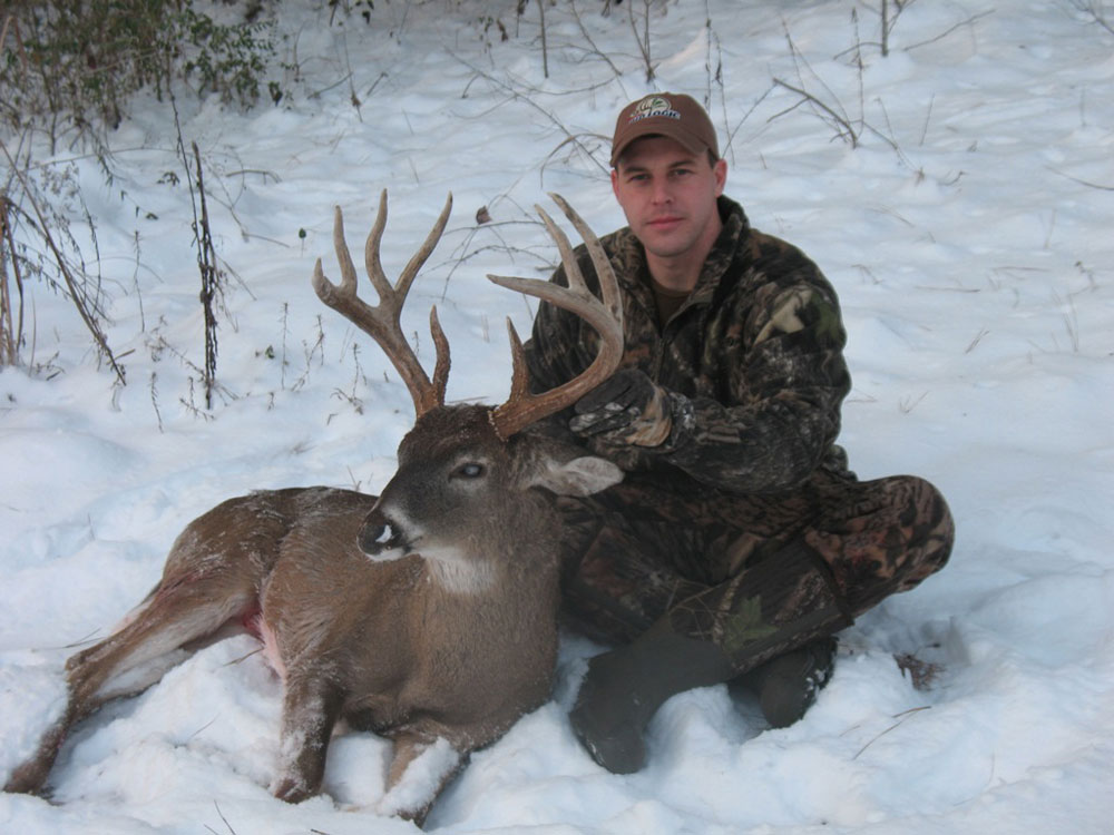 Austin Delano with winter buck