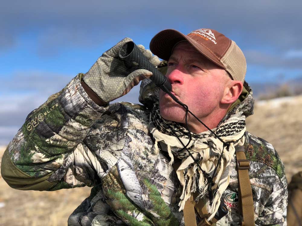 Mark Kayser coyote hunting with dog