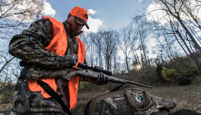 Hunter unloading rifle