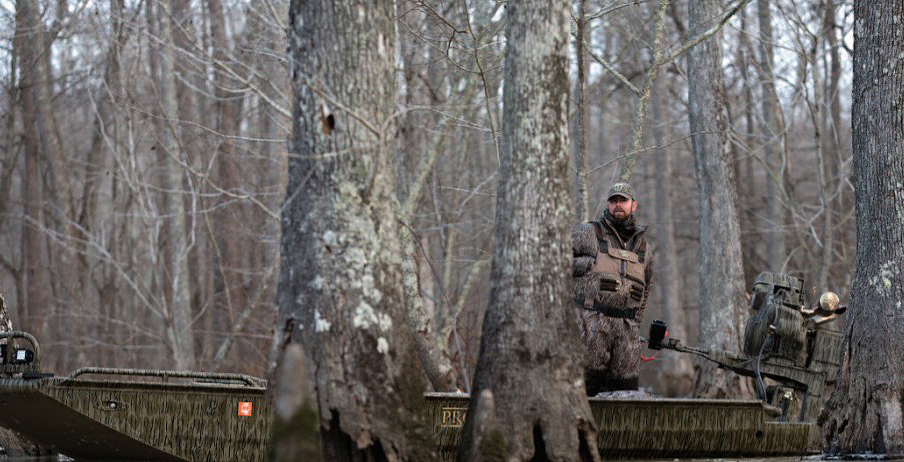 duck hunter on boat