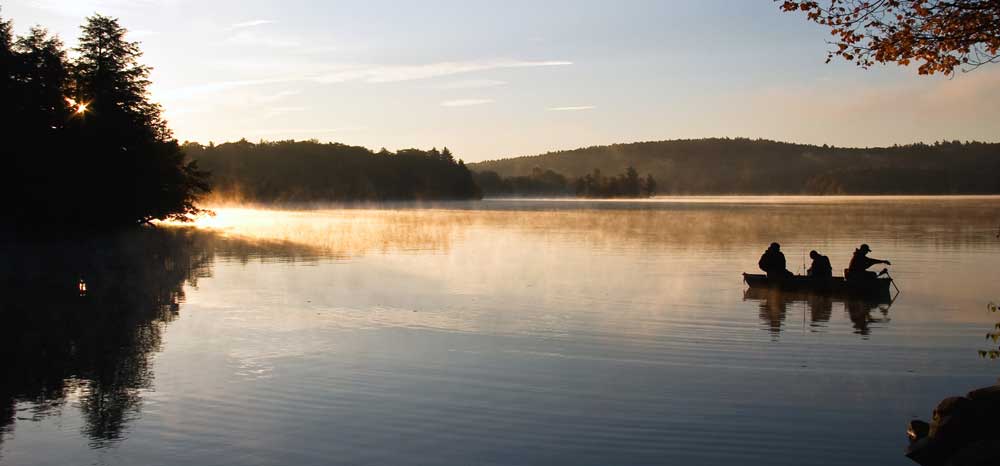 fishermen on a lake