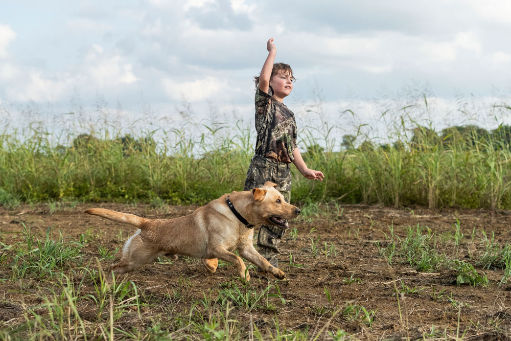 kid with dog