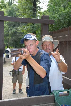 student receiving shooting instructions