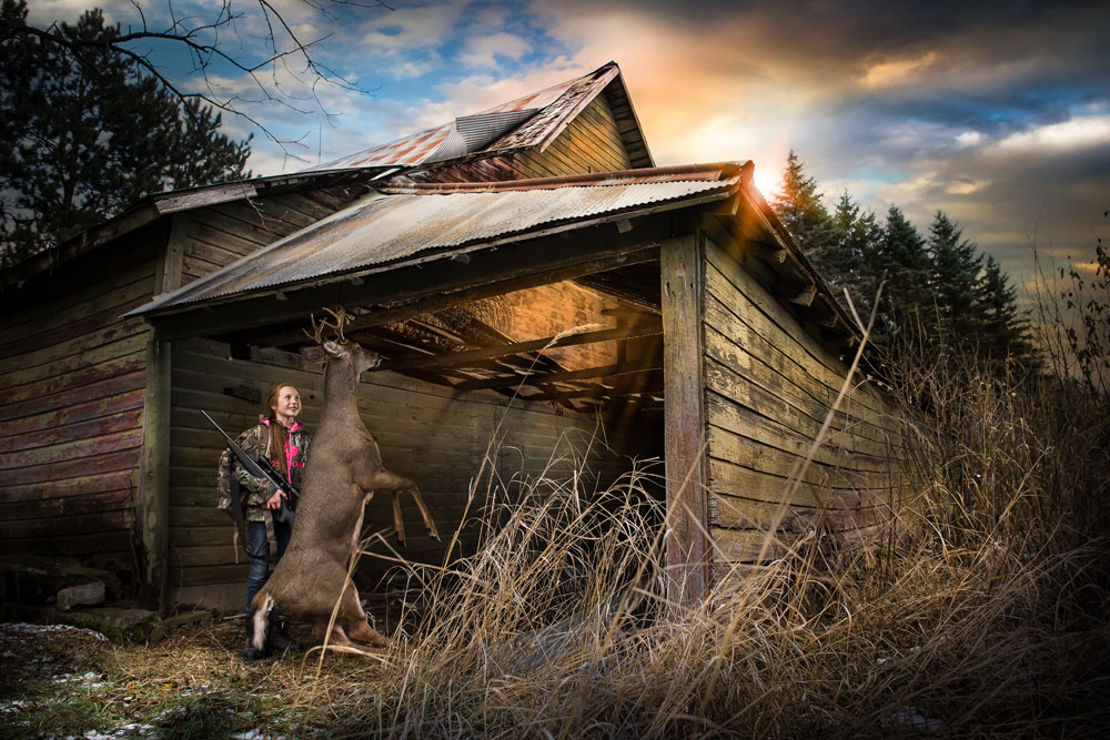 girl with hanging buck