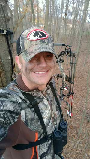 Chris Jones in a tree stand