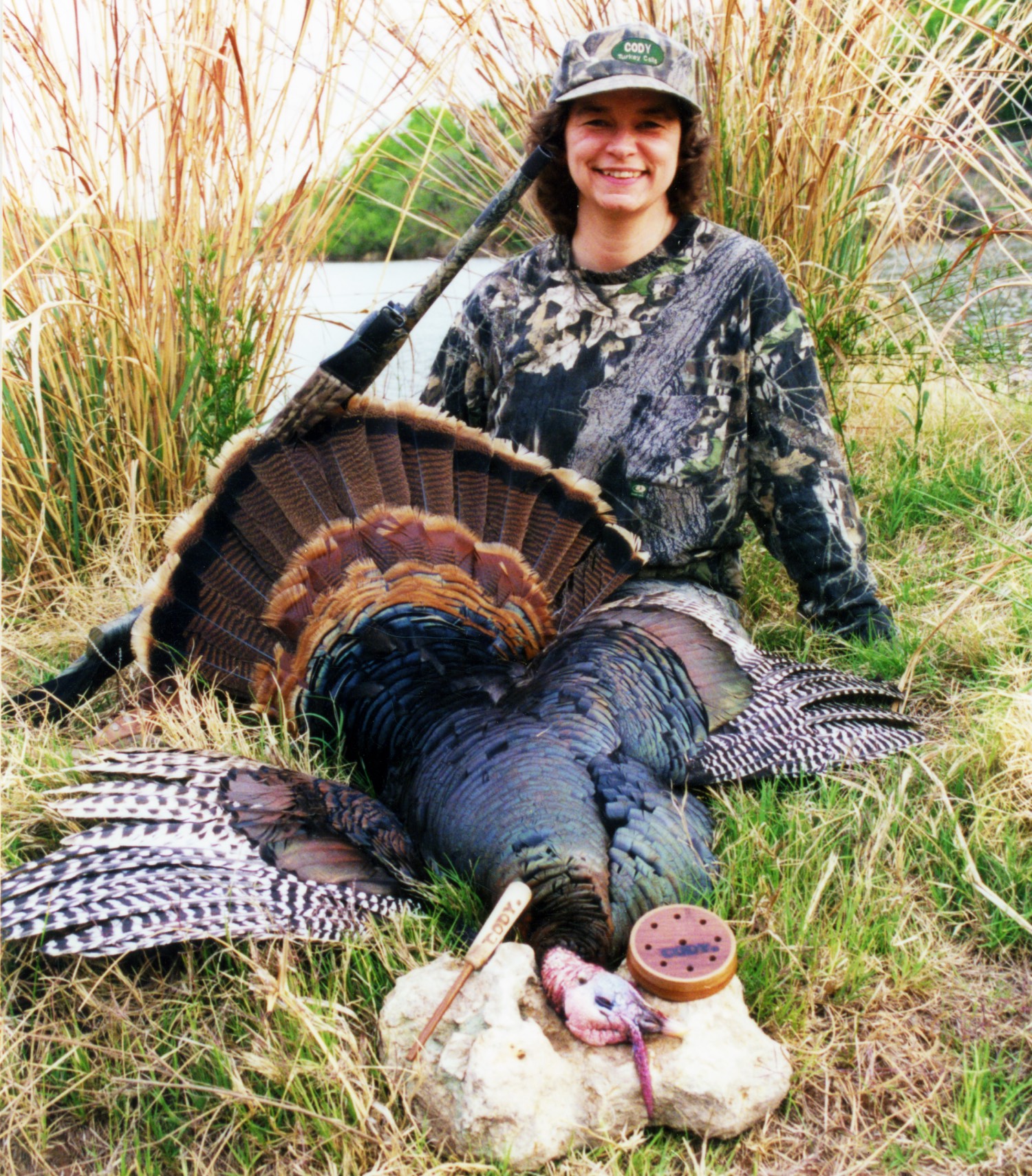 Debbie zearing with a turkey