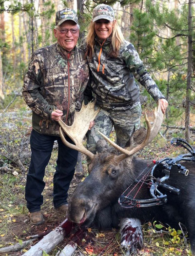 Donnelle Johnson and her dad with moose