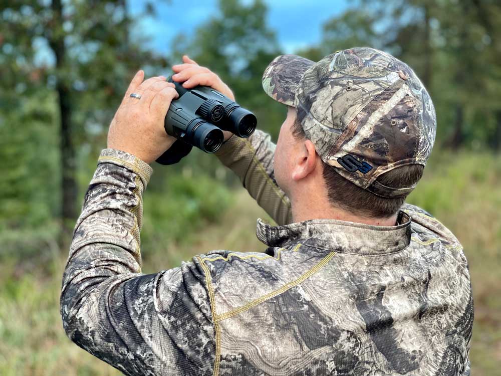 deer scouting with binoculars