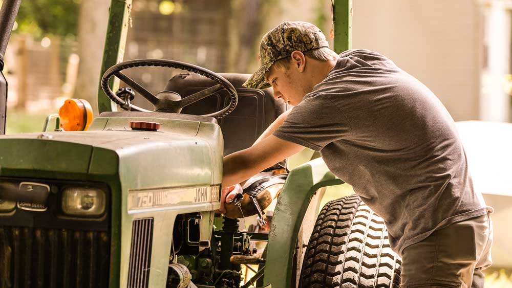 helping landowners on the farm tractor