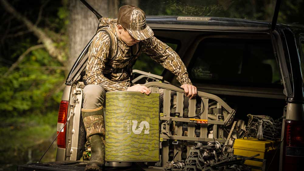 hunter with treestand