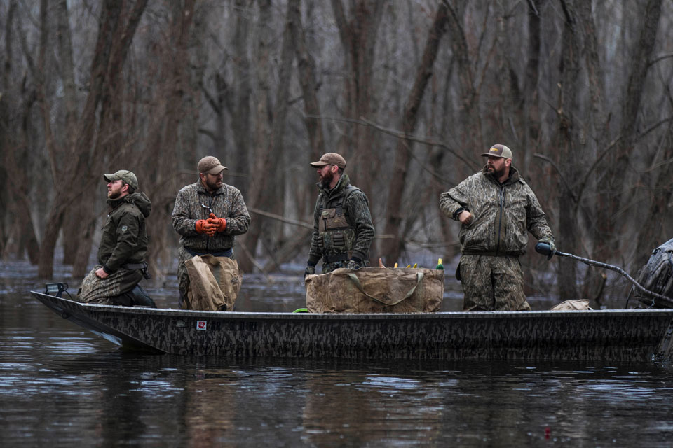 duck hunters in boat