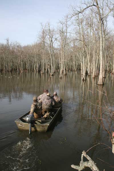 Duck hunters in boat