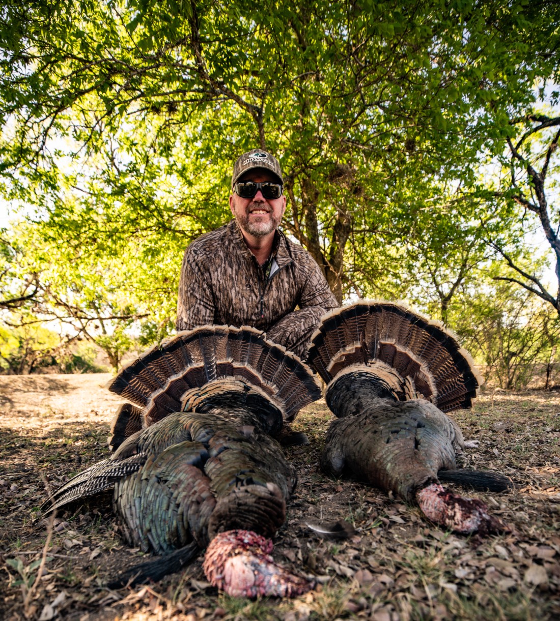 Joe Bogart poses with his two turkeys