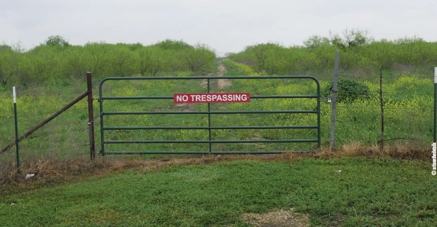 No Trespassing Sign on Property Gate