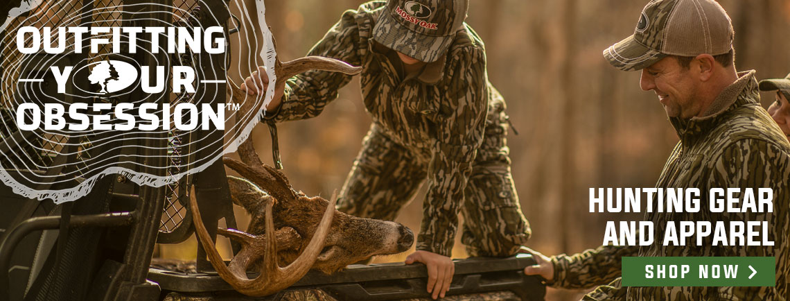 two men load a large buck into a side by side