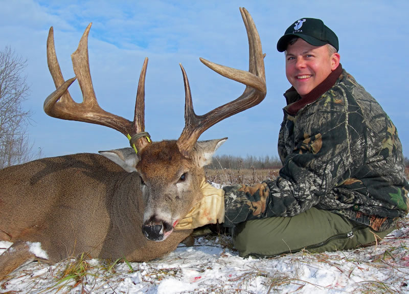 This buck cut a scent trail of Special Golden Estrus and followed it past the author’s blind just after a system of heavy winds and snow broke into a high pressure system - photo credit: Todd Amendrud