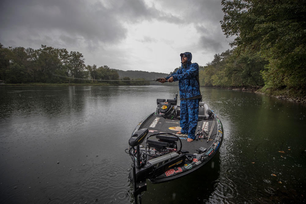 Ott DeFoe casting in the rain