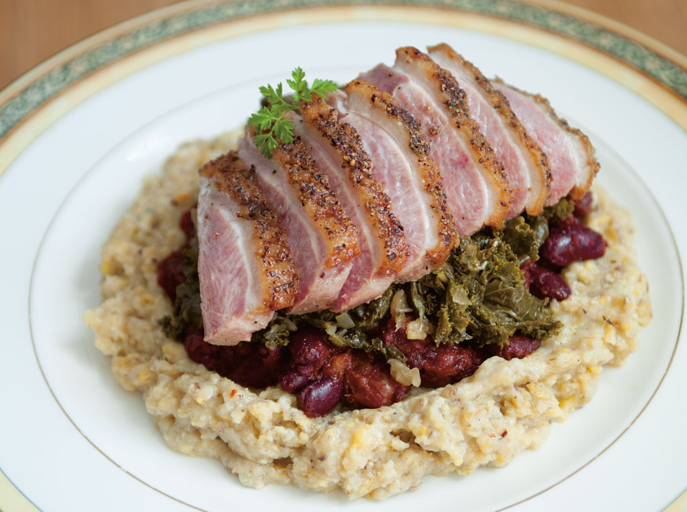 roast duck over beans and grits