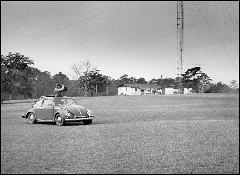 man driving around in a Volkswagen 