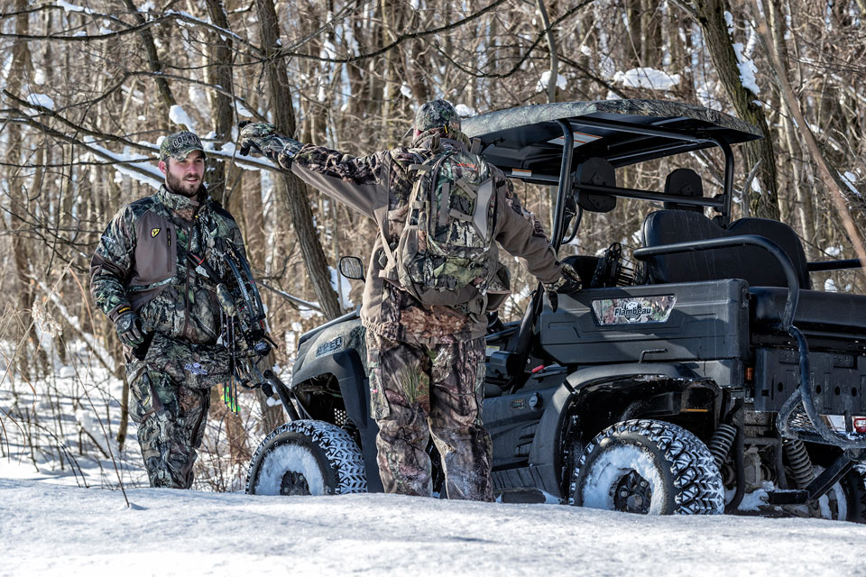 deer hunters in the snow