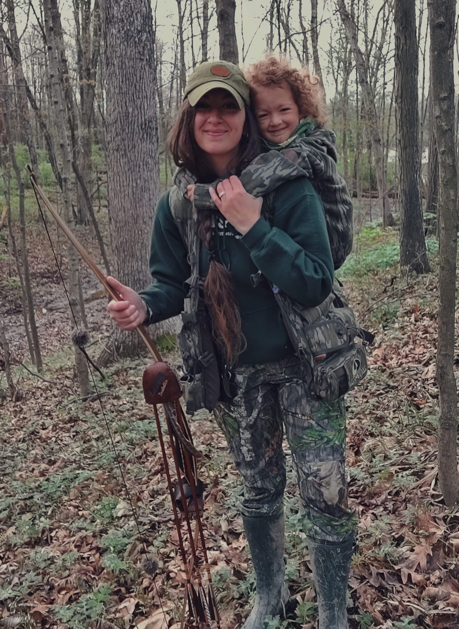 beka garris and her daughter, on her back