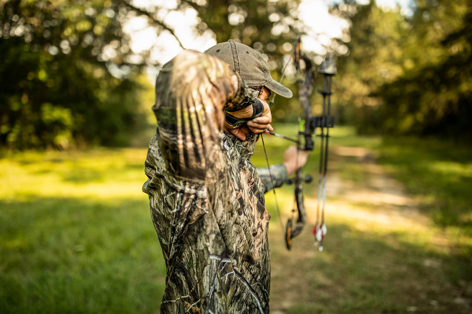 man shooting a bow
