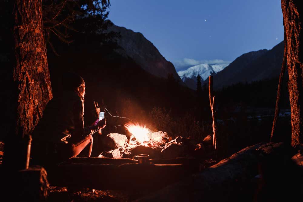 cold camping by fire