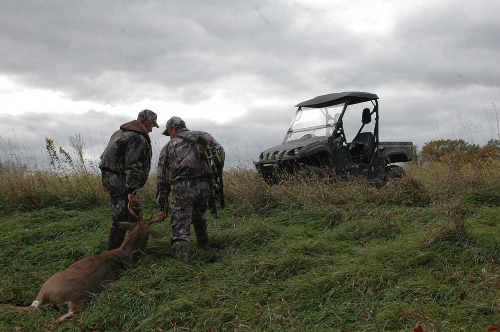 dragging deer to atv