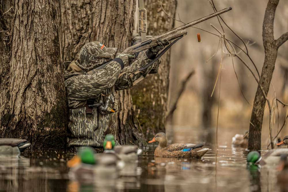 duck hunter with Benelli shotgun