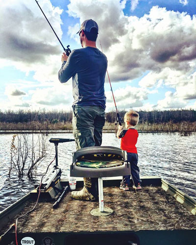 Drew Benton and son fishing