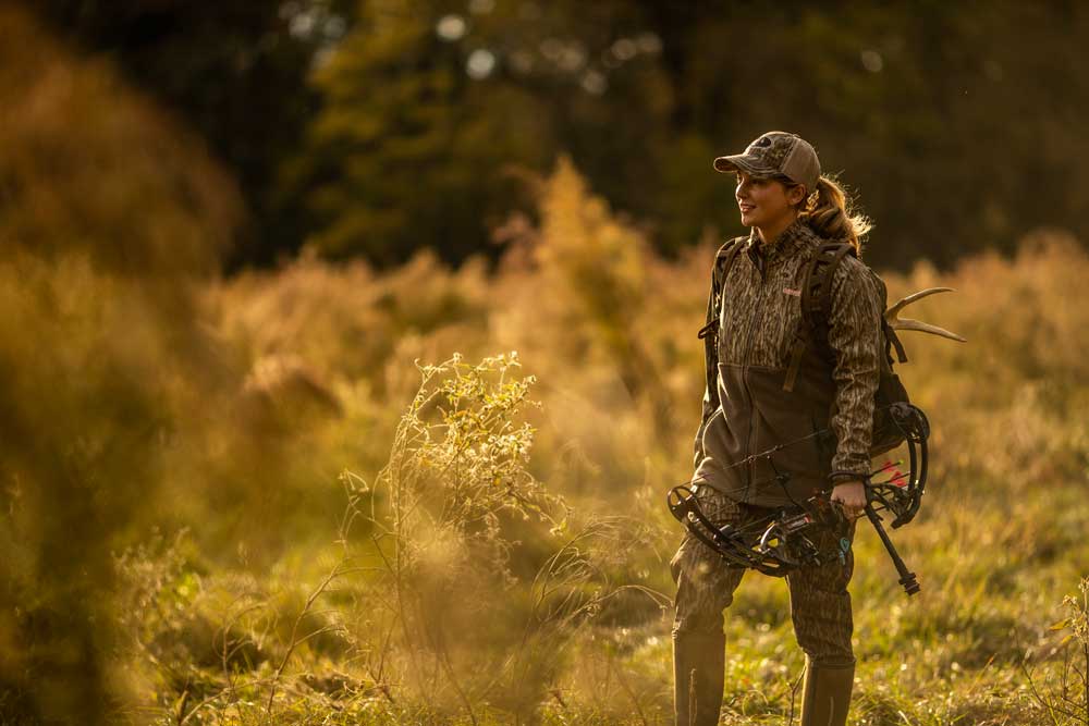 female bowhunter