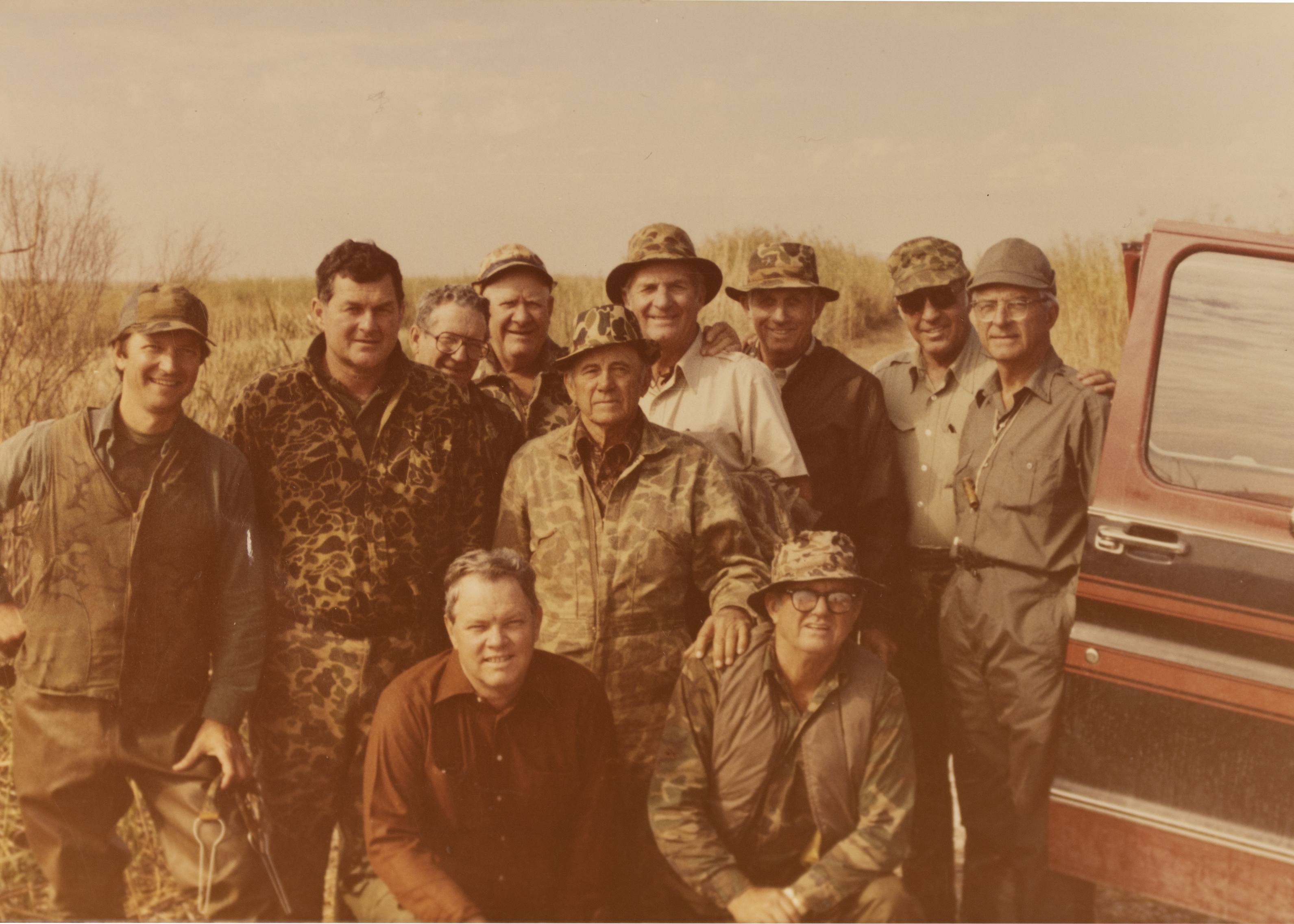 a group of men in old army camo
