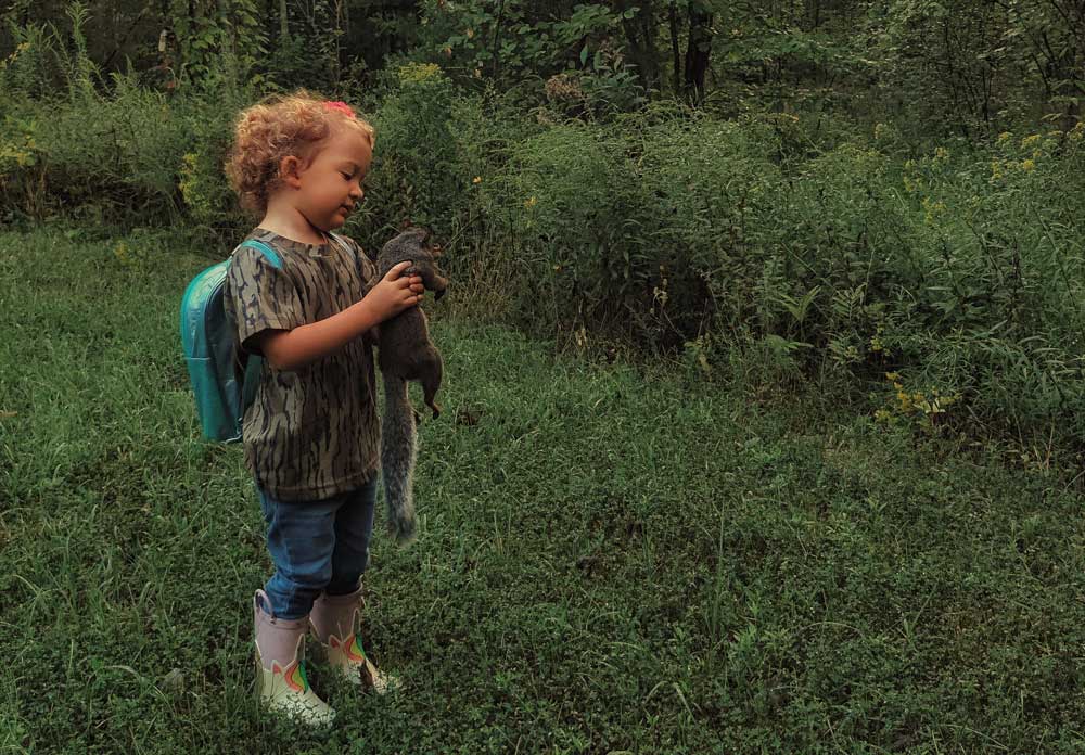 girl with squirrel