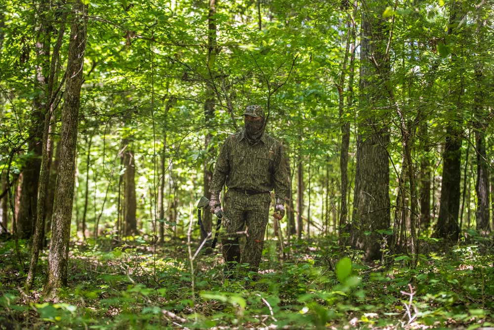hunter in green woods