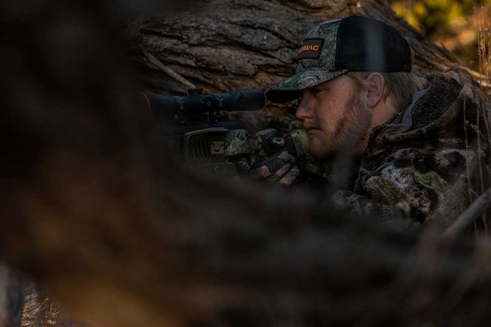 hunter looking through scope