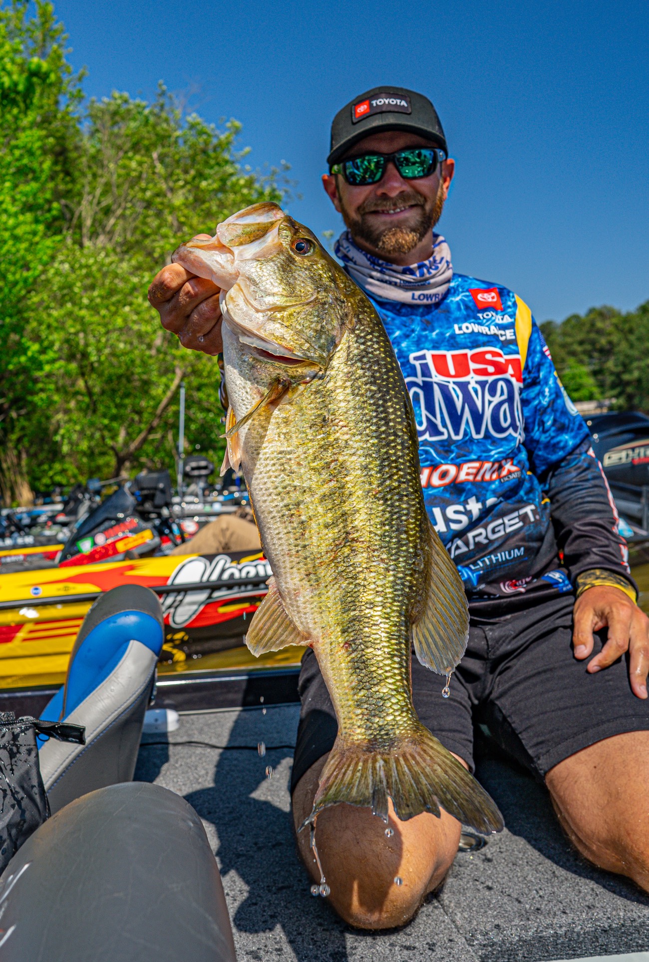 Brandon Lester holds up a big bass