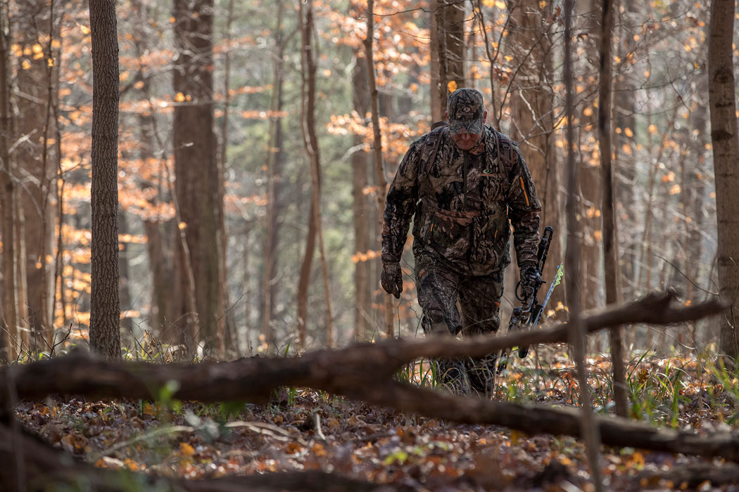 hunter walking the woods