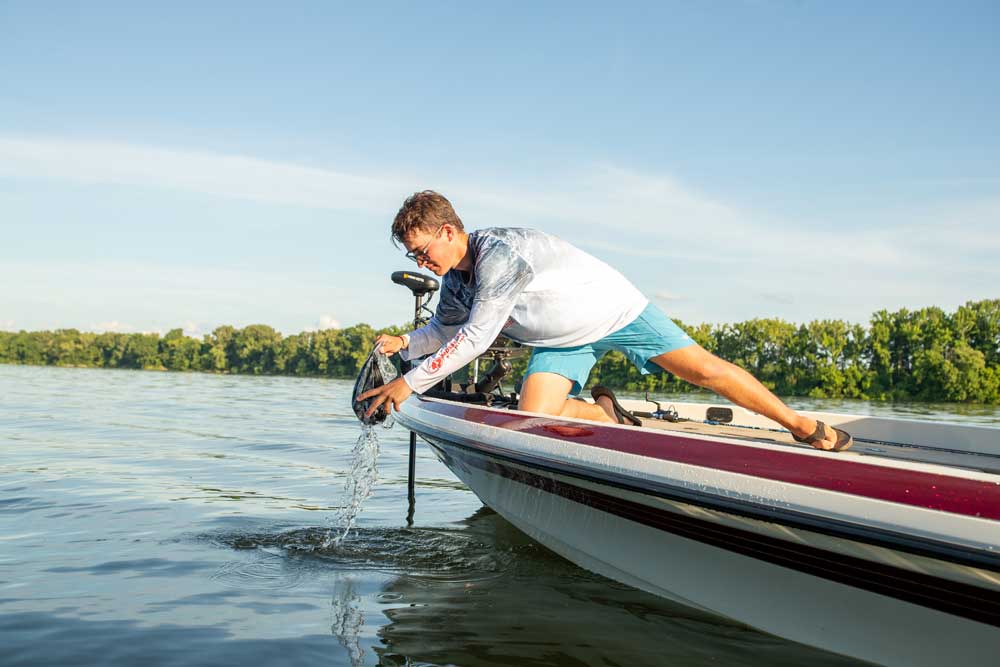 man in fishing boat