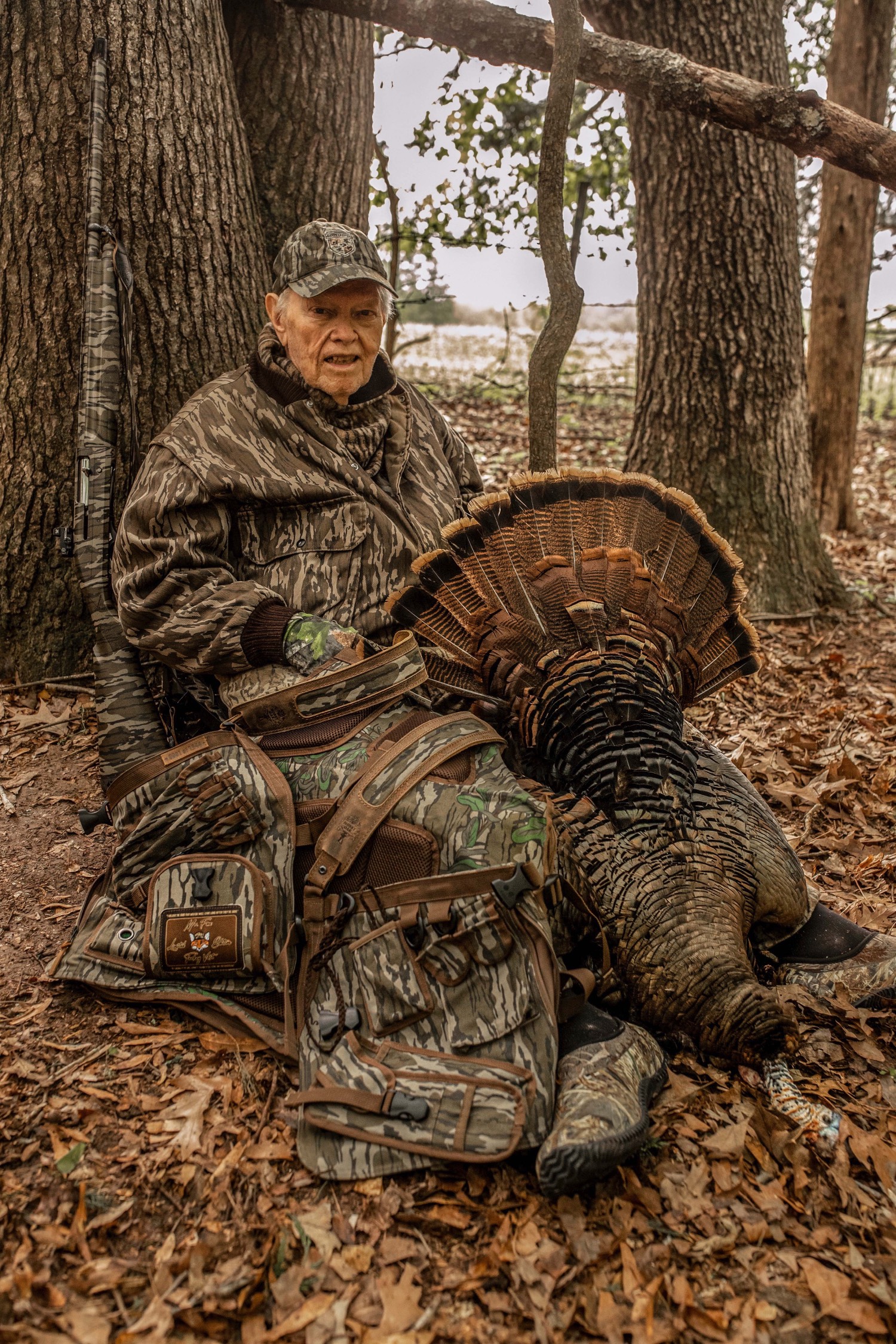 mr fox posing with a turkey and the mr fox vest next to him