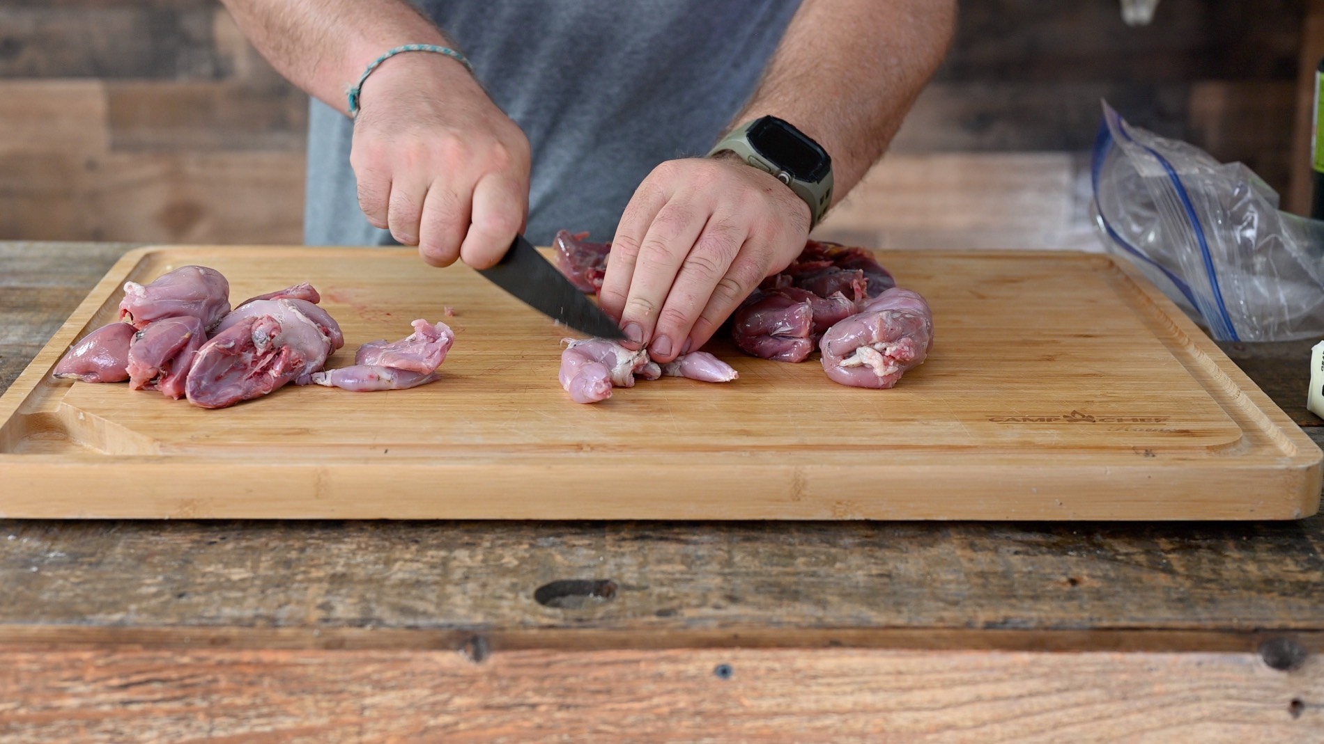 man chopping up dove