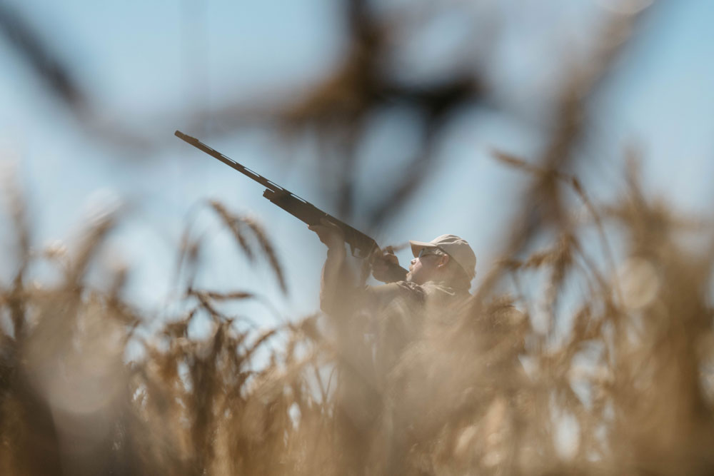 shooting shotgun