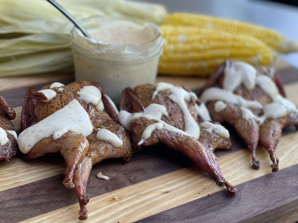 smoked quail with white bbq sauce