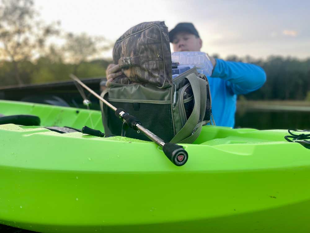 tackle bag on kayak