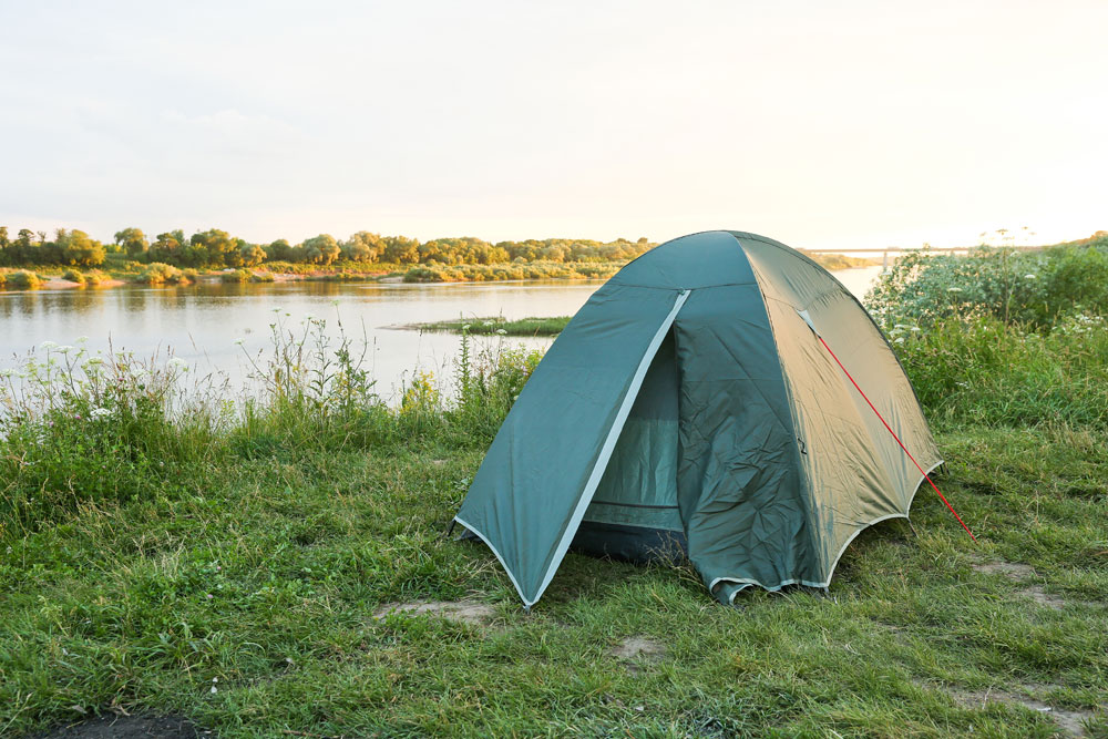 tent by a lake