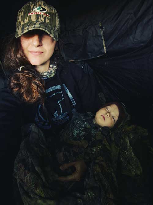 toddler napping in hunting blind