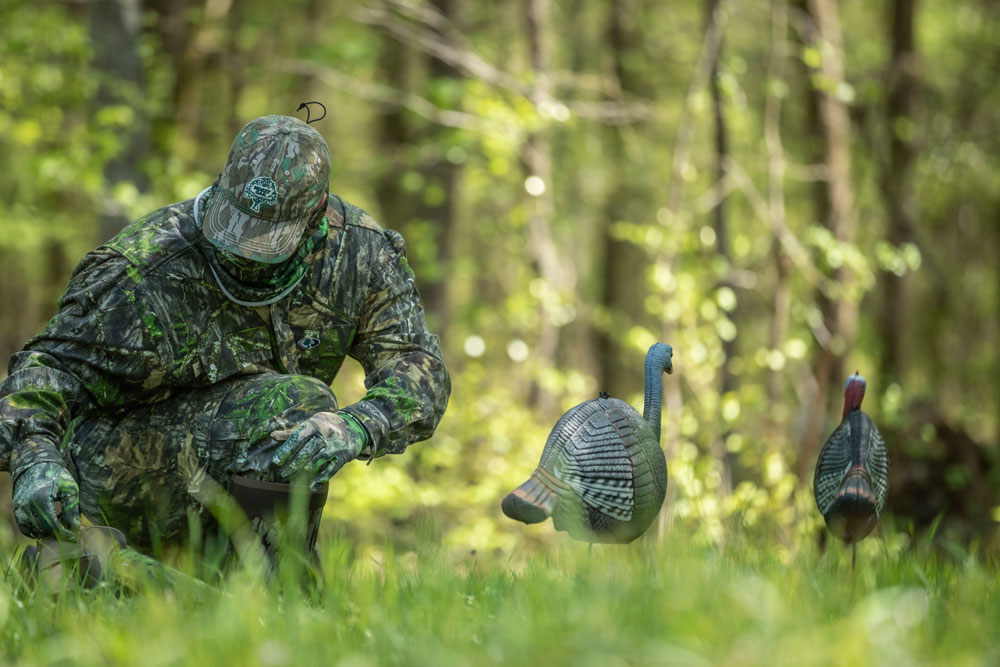 turkey hunter with decoys