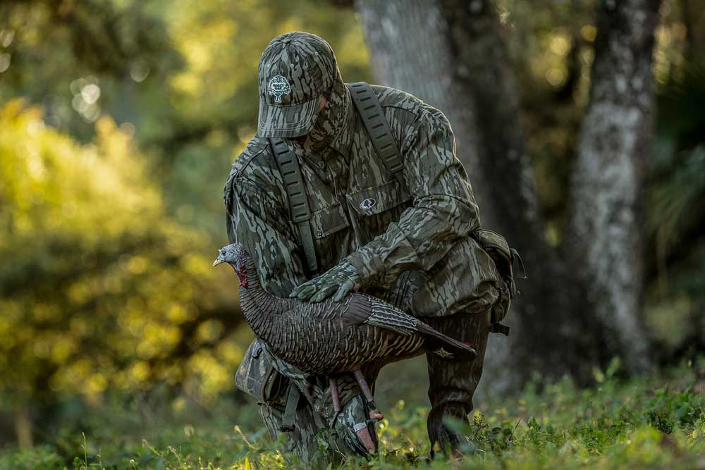 turkey hunter with hen decoy