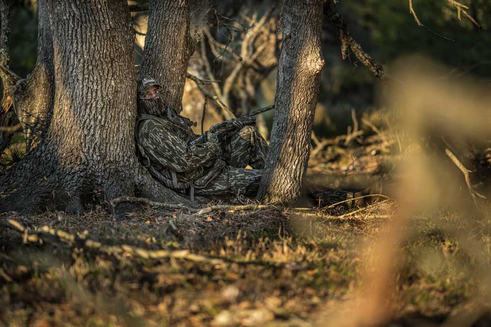 turkey hunter sitting