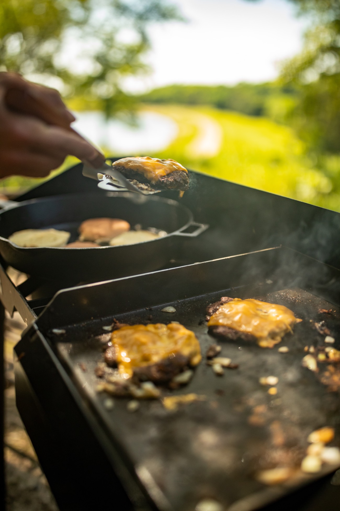 cheese burgers on the grill