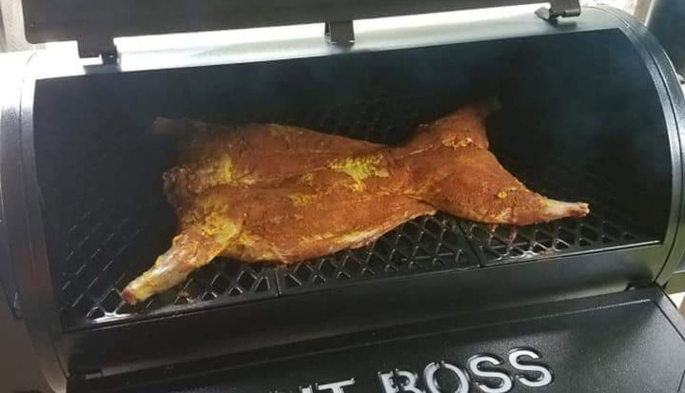 whole hog on a grill